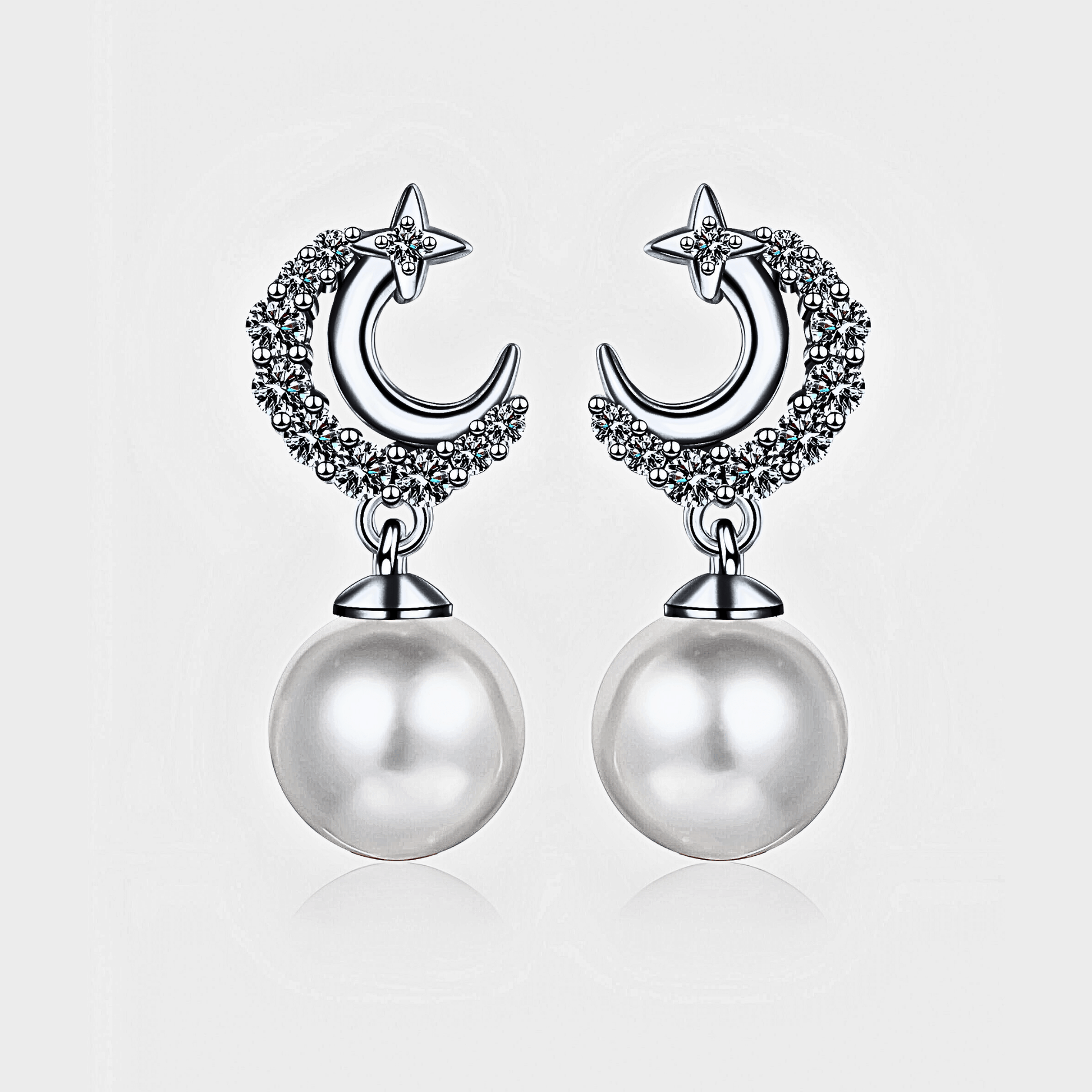 Lunetta Drops - Moissanite Pearl Earrings in 925 sterling silver. Featuring a silver crescent design with freshwater pearls.