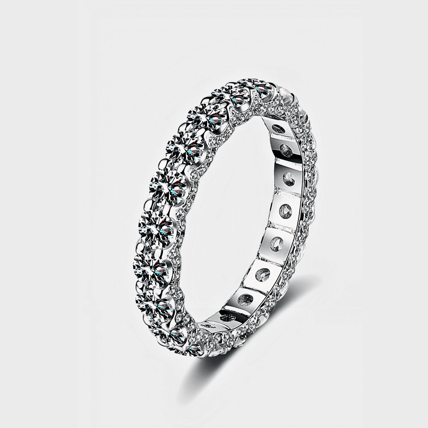 Orbit Band 2.1ct - Moissanite eternity Ring made from 925 sterling silver, rhodium plating, and 2.1 carats of white moissanite.