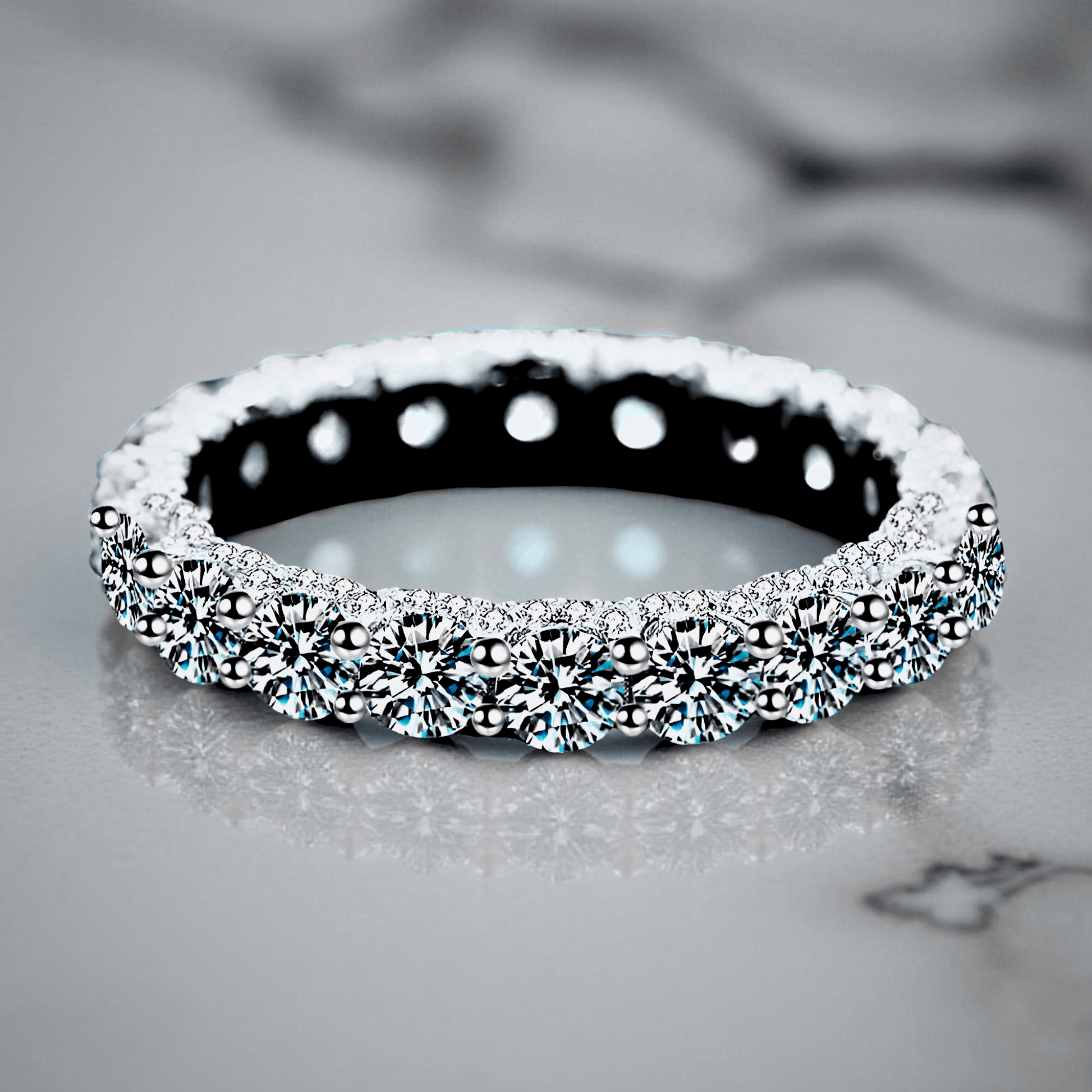 Orbit Band 2.1ct - Moissanite eternity Ring made from 925 sterling silver, rhodium plating, and 2.1 carats of white moissanite.