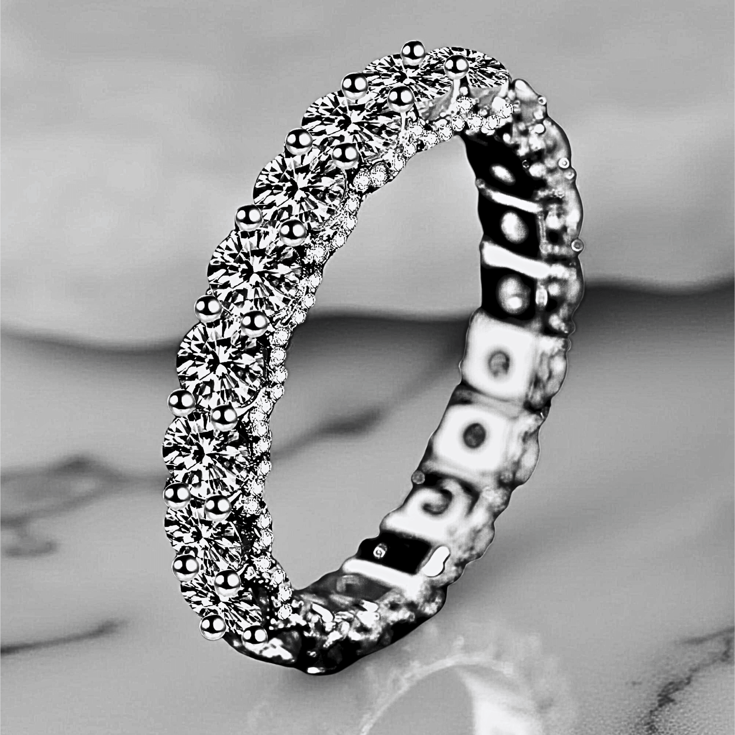 Orbit Band 2.1ct - Moissanite eternity Ring made from 925 sterling silver, rhodium plating, and 2.1 carats of white moissanite.