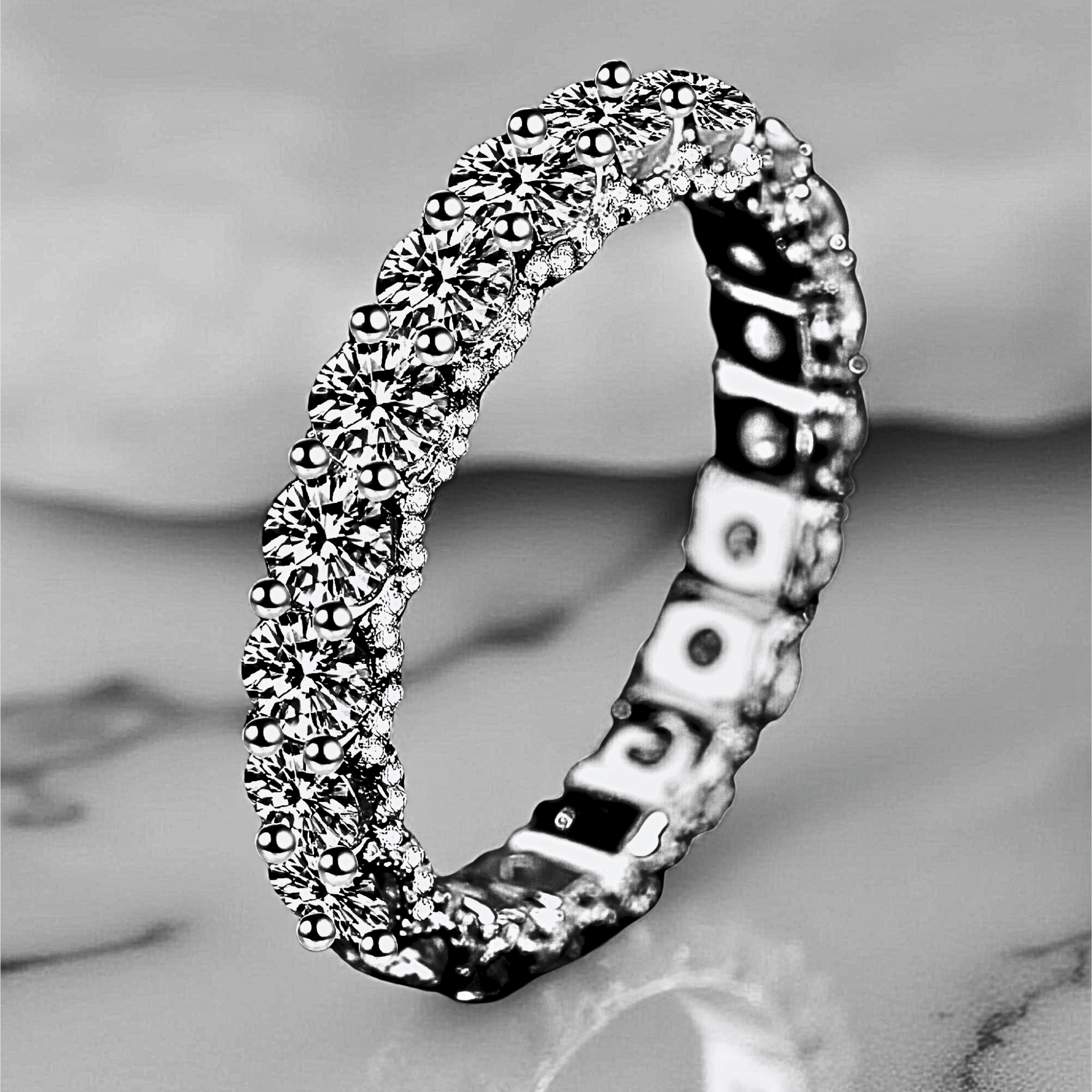 Orbit Band 2.1ct - Moissanite eternity Ring made from 925 sterling silver, rhodium plating, and 2.1 carats of white moissanite.