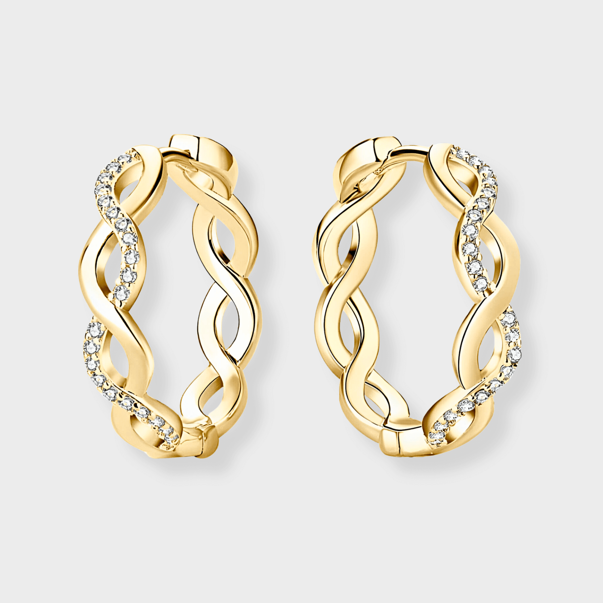Vita Hoops - Hoop Earrings in 18k gold featuring a crisscross design with moissanite accents. | Gold moissanite earrings