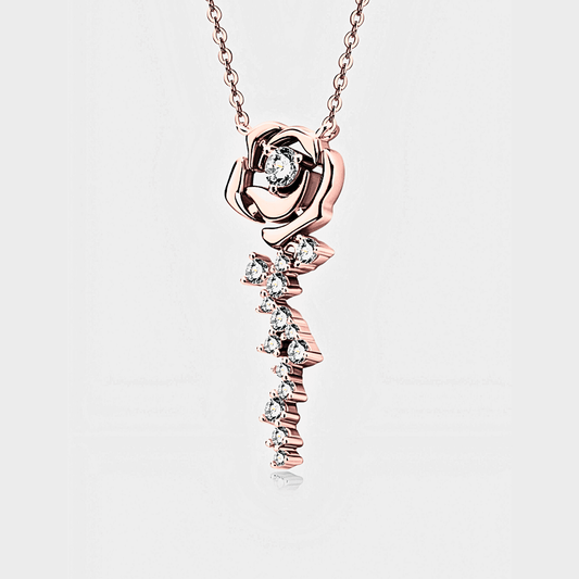 Rosalia Pendant - Rose Gold Necklace featuring a floral design with white moissanite and 18k rose gold plating.