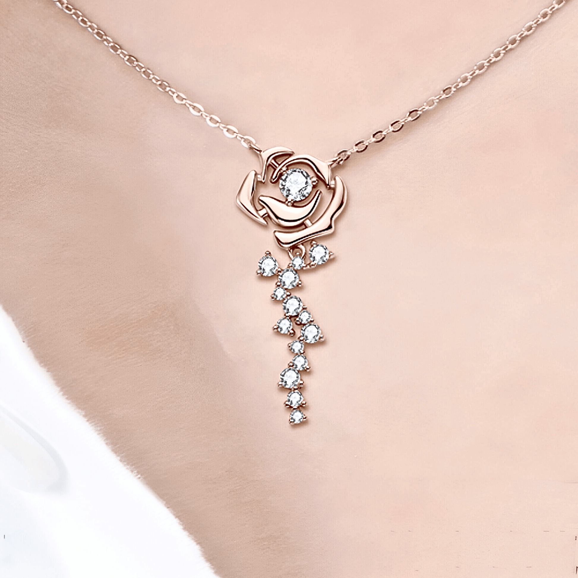 Rosalia Pendant - Rose Gold Necklace featuring a floral design with white moissanite and 18k rose gold plating.