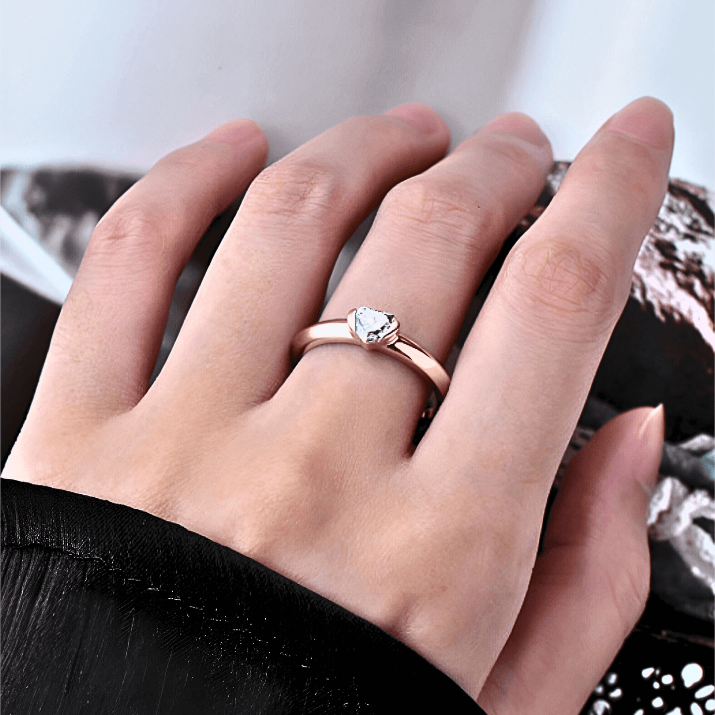 model wearing the Sylvie Ring 0.5ct - Rose Gold Ring featuring a heart shaped moissanite stone.