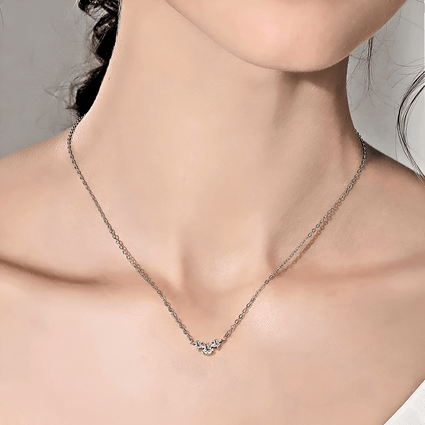 model wearing the Cosima Pendant 0.5ct - Inlaid Moissanite necklace in 925 sterling silver