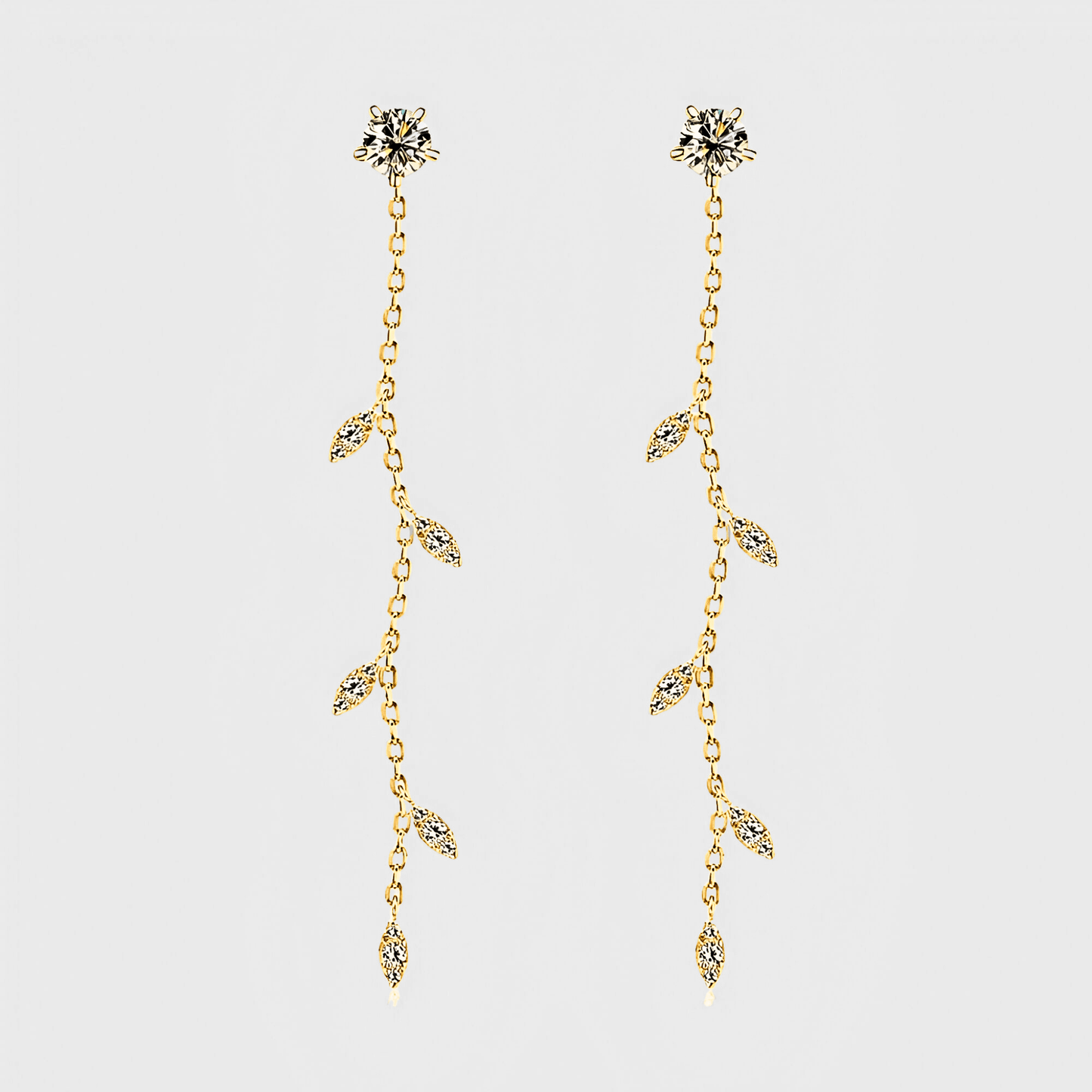 Edera Drops 1.38ct - Moissanite Leaf Earrings in 18k gold. featuring a leaf shape design along a free-flowing chain.