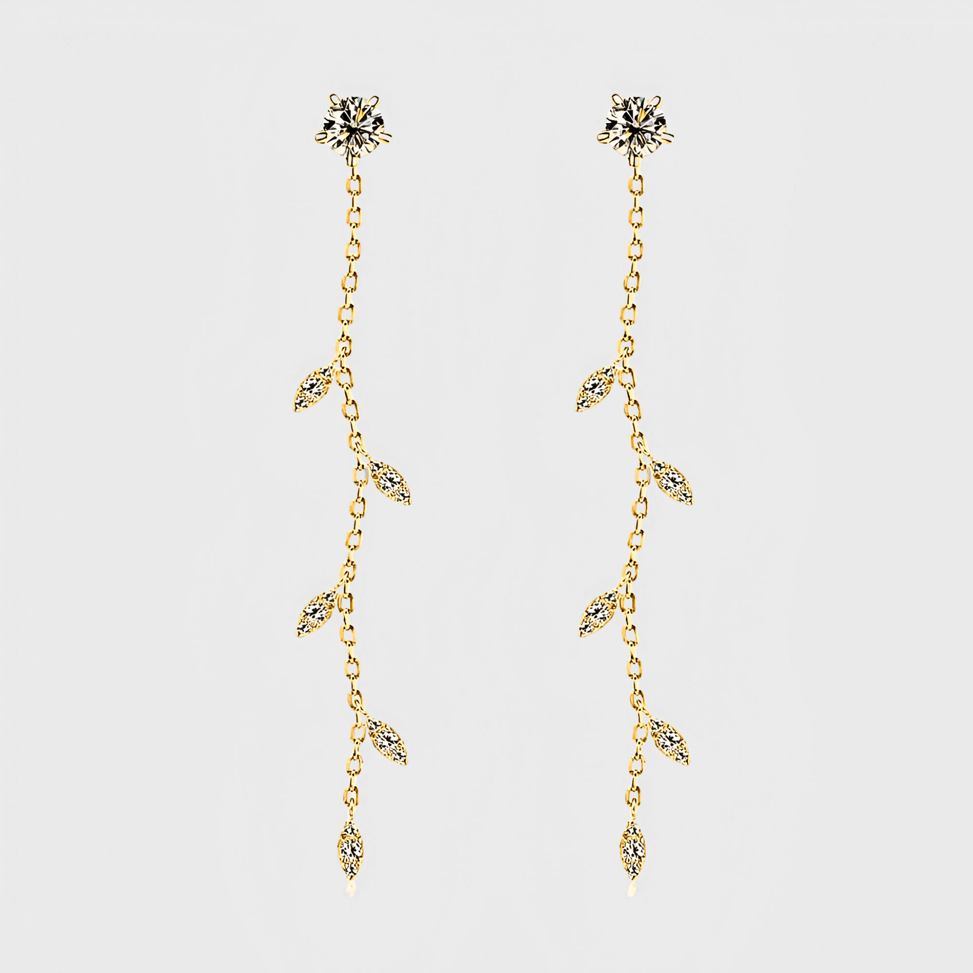Edera Drops 1.38ct - Moissanite Leaf Earrings in 18k gold. featuring a leaf shape design along a free-flowing chain.
