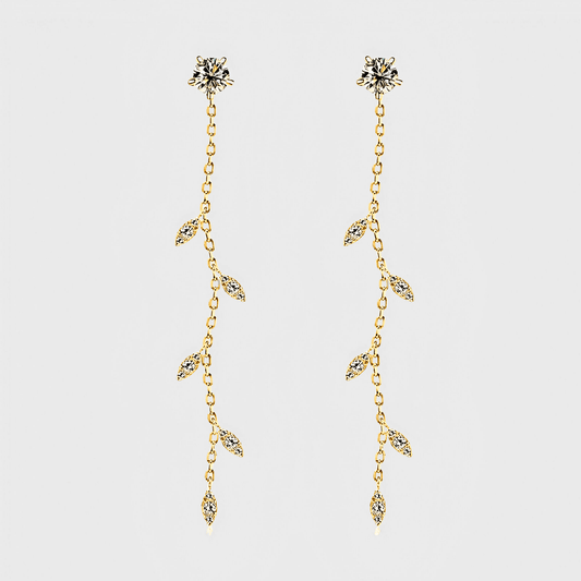 Edera Drops 1.38ct - Moissanite Leaf Earrings in 18k gold. featuring a leaf shape design along a free-flowing chain.