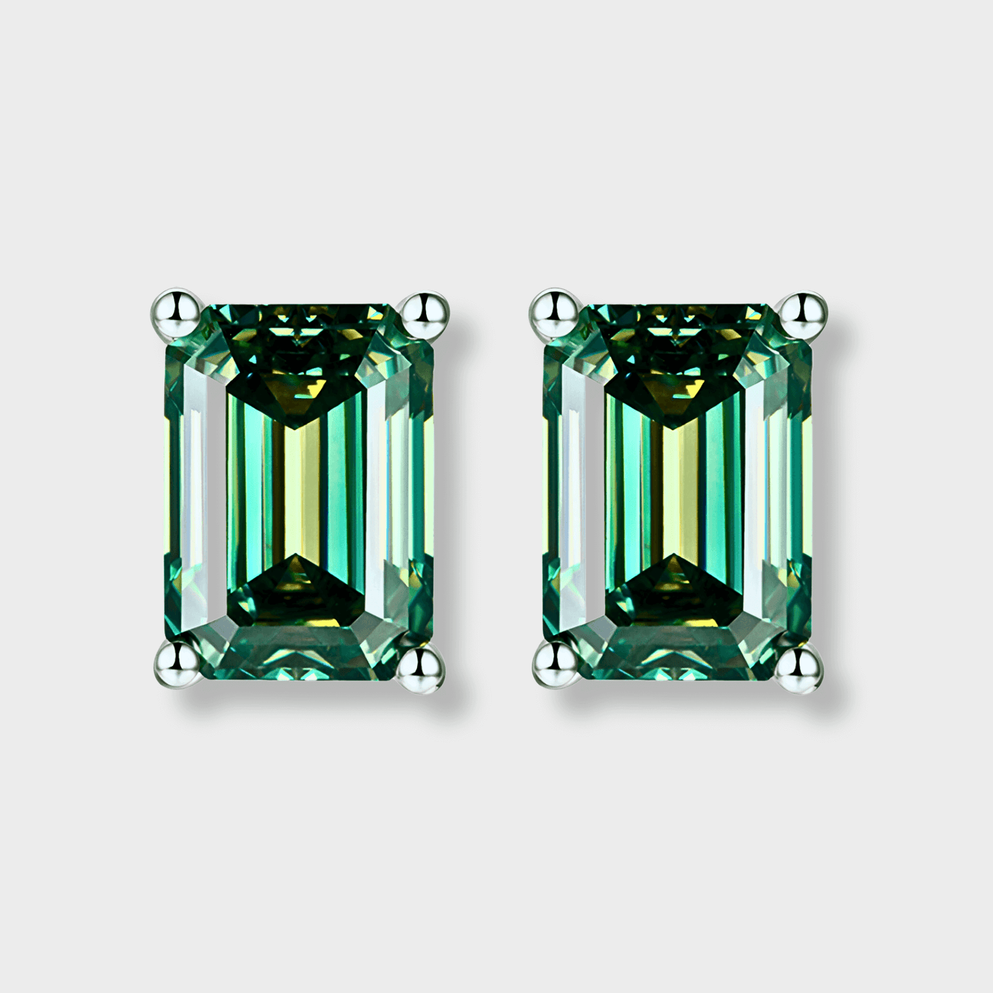 Juniper Studs – 2ct Green Moissanite Earrings in 925 sterling silver with elegant emerald cut design.