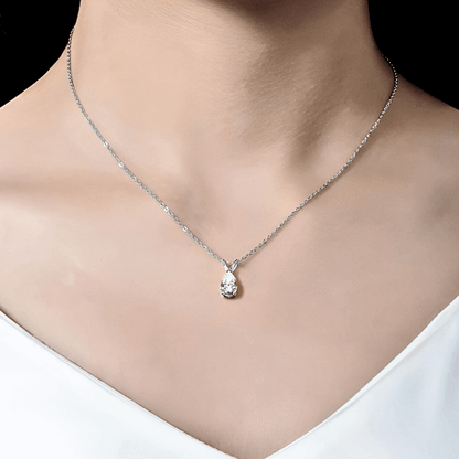 Mira Pendant 1.5ct - Teardrop necklace in polished 925 sterling silver with 1.5 carats of white moissanite. worn on model's neck.