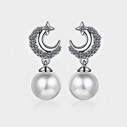 Lunetta Drops - Moissanite Pearl Earrings in 925 sterling silver. Featuring a silver crescent design with freshwater pearls.