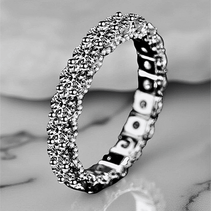 Orbit Band 2.1ct - Moissanite eternity Ring made from 925 sterling silver, rhodium plating, and 2.1 carats of white moissanite.