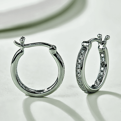 Tallis Hoops - silver moissanite earrings in a hoop design. made from 925 sterling silver. 