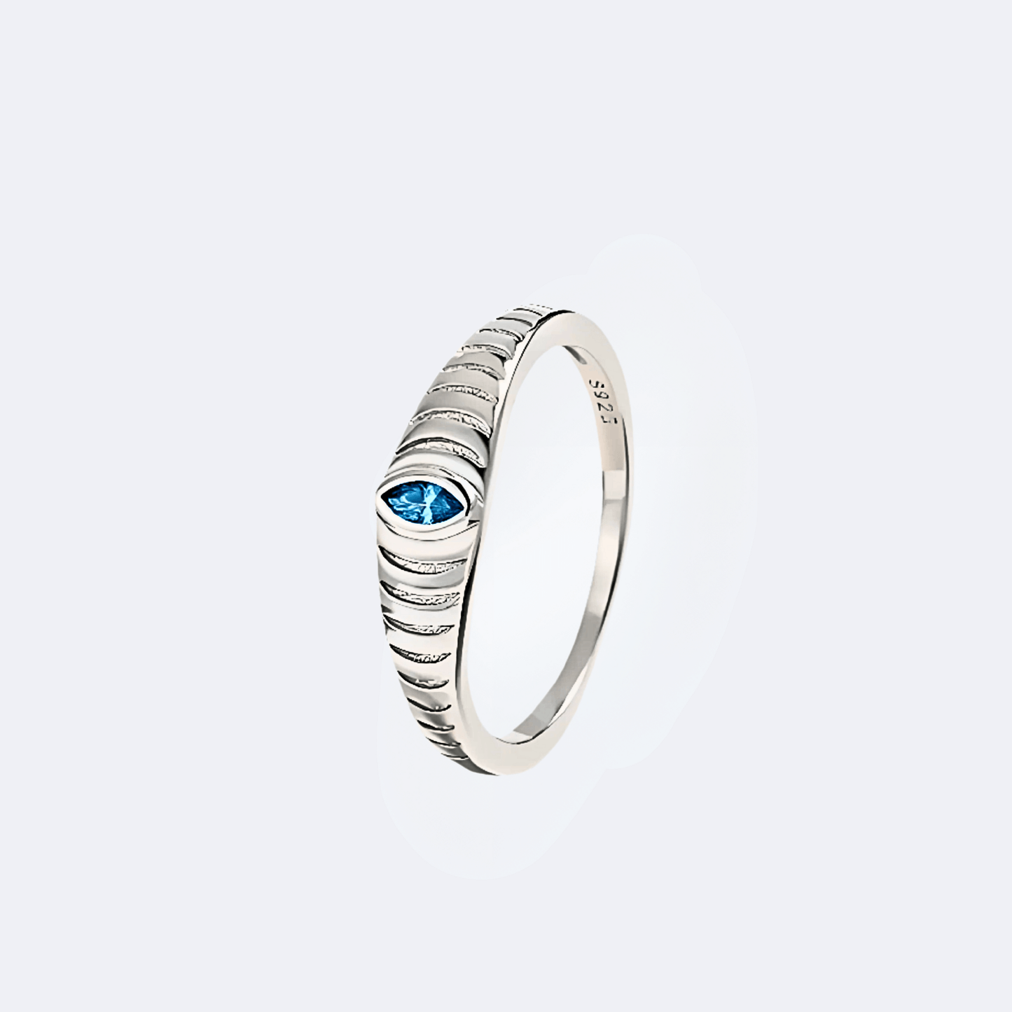Iridian Band in 925 Sterling Silver featuring a blue zircon marquise cut and etched design.